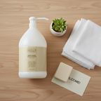 Guild + Pepper Warm Oak Body Wash in a host amenity flat lay