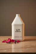 Le Labo Rose 31 1-gallon conditioner professional refill bottle on marble vanity — luxury hotel amenity supply for boutique hotels, Airbnb STR, superyacht and private aviation