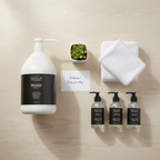 Guild+Pepper Warm Oak Body Lotion in a host amenity flat lay