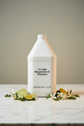 Le Labo Bergamote 22 1 gallon shampoo professional refill on marble vanity for luxury hotel STR superyacht and private aviation amenity procurement